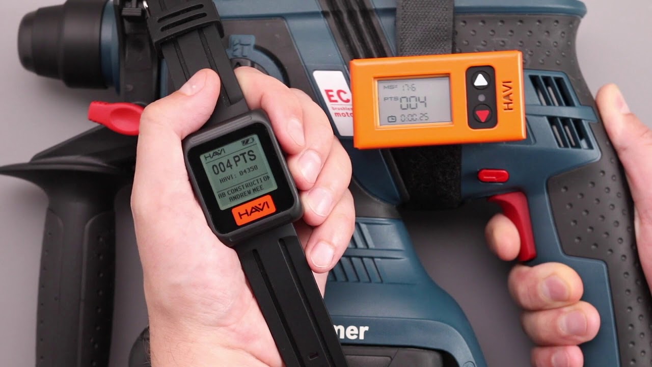 Wearable and tool-mounted sensor displaying live hand-arm vibration exposure points.
