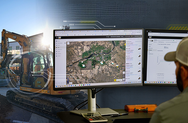 Telematics dashboard tracking the plant fleet on screen in the site office.